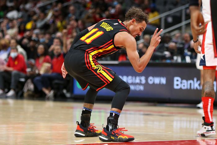 Atlanta Hawks guard Trae Young (11) celebrates after a made basket against the Washington Wizards in the second half at State Farm Arena.